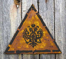 Image showing Russian Double Eagle on Rusty Warning Sign.