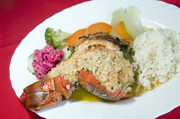 Image showing fresh Caribbean lobster tails cooked garlic and butter with loca