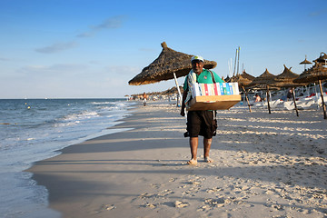 Image showing Seller on beach