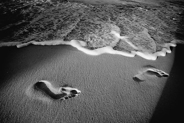 Image showing Footprints on beach black and white