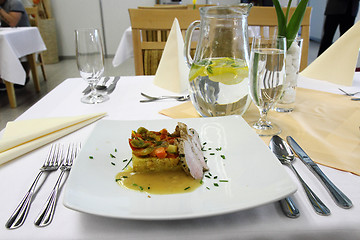 Image showing traditional vegetable ratatouille and pig meat 