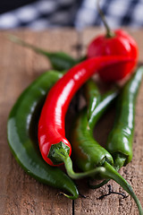 Image showing Red and green chili peppers