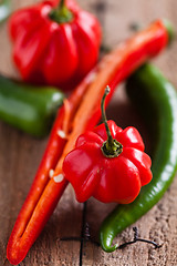 Image showing Red and green chili peppers