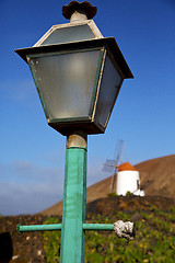 Image showing windmills spain street lamp a bulb in the blue  