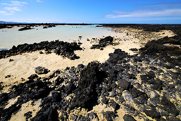 Image showing people spain  hill   spiral of black rocks in the   lanzarote 