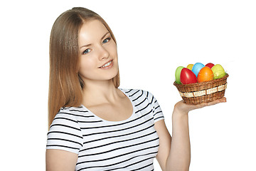 Image showing Female holding basket with Easter eggs