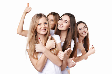 Image showing Happy group of friends gesturing thumbs up