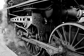 Image showing Wheels of an old steam locomotive