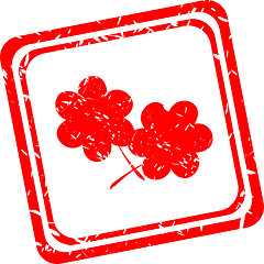 Image showing flower symbol on red grunge web stamp