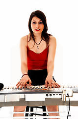 Image showing Woman playing on keyboard.