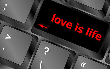 Image showing Modern keyboard with love is life text symbols