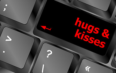 Image showing hugs and kisses words on computer keyboard keys