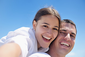 Image showing happy couple have fun on the beach