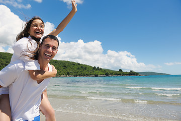 Image showing happy couple have fun on the beach