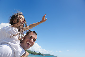 Image showing happy couple have fun on the beach