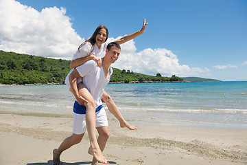 Image showing happy couple have fun on the beach