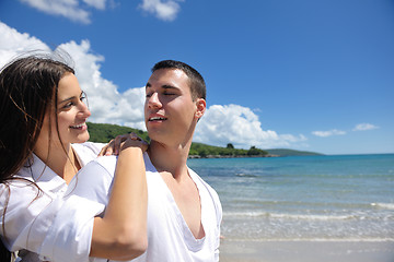 Image showing happy couple have fun on the beach