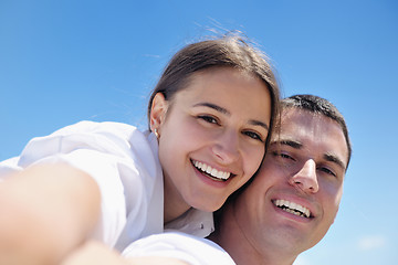 Image showing happy couple have fun on the beach