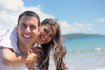 Image showing happy couple have fun on the beach