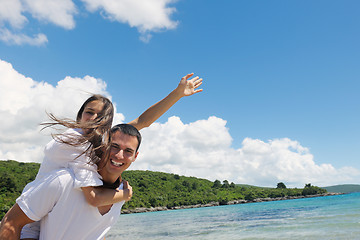 Image showing happy couple have fun on the beach