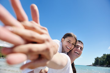 Image showing happy couple have fun on the beach