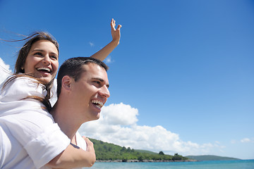 Image showing happy couple have fun on the beach