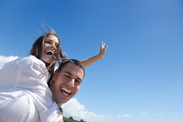 Image showing happy couple have fun on the beach