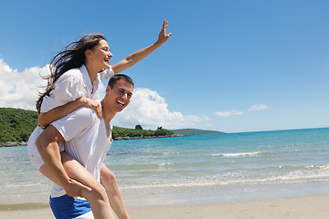 Image showing happy couple have fun on the beach