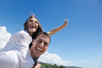 Image showing happy couple have fun on the beach