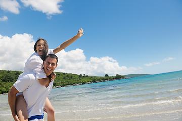 Image showing happy couple have fun on the beach