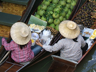 Image showing Two women in a floating market