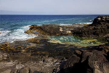 Image showing coastline in lanzarote   sky cloud beach  water  musk  and summe