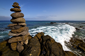 Image showing in lanzarote coastline  froth    rock stone sky cloud beach     