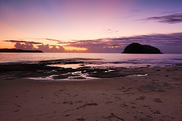 Image showing Ocean dawn sunrays and silhouettes