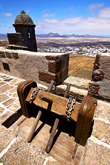 Image showing winch    lanzarote  spain the old wall castle  sentry tower and 