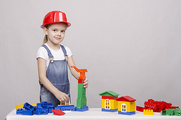 Image showing Girl playing in the constructor