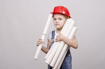 Image showing Child engineer keeps many drawings