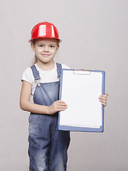 Image showing Portrait of child in helmet and a folder