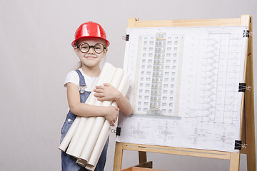 Image showing child glasses helmet stands with drawings of Board