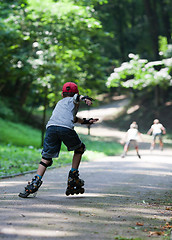 Image showing Kids rollerblading