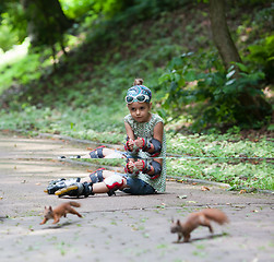 Image showing Rollergirl and squirrels