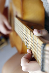 Image showing Playing the guitar