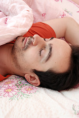 Image showing Portrait of a young man sleeping.