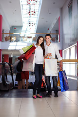 Image showing happy young couple in shopping