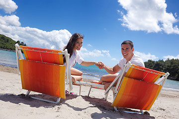 Image showing happy couple have fun on the beach