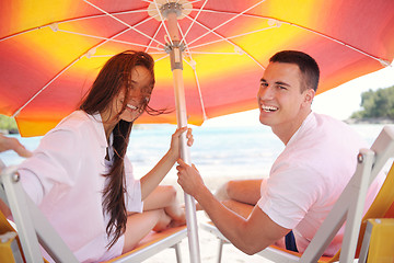 Image showing happy couple have fun on the beach