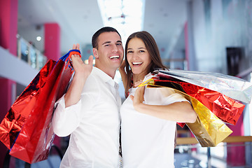 Image showing happy young couple in shopping