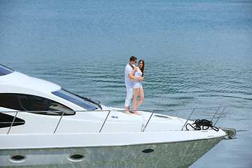 Image showing young couple on yacht