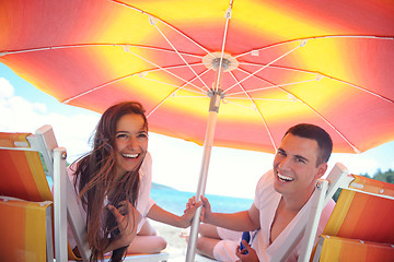 Image showing happy couple have fun on the beach