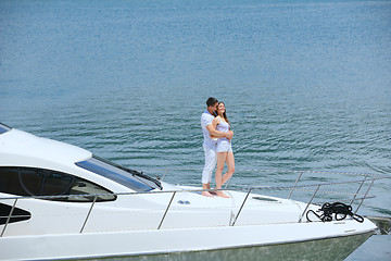 Image showing young couple on yacht